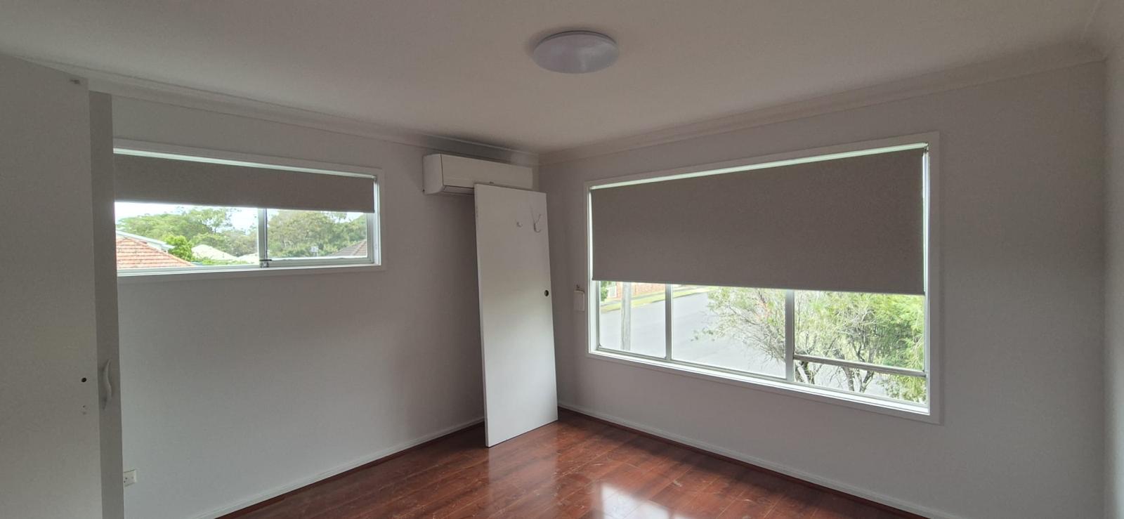 Matching roller blinds in a freshly renovated apartment