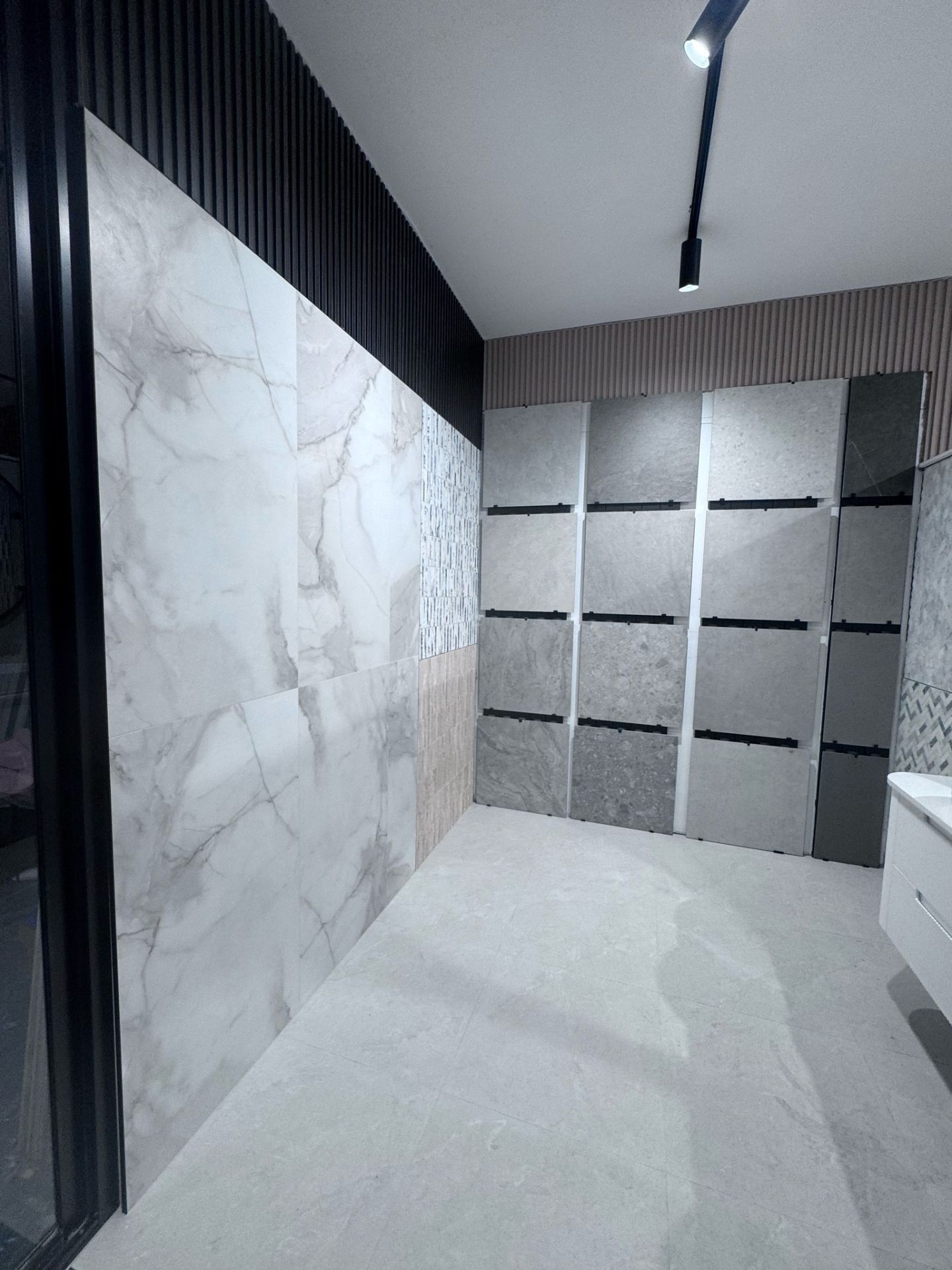 Large format porcelain tile display wall