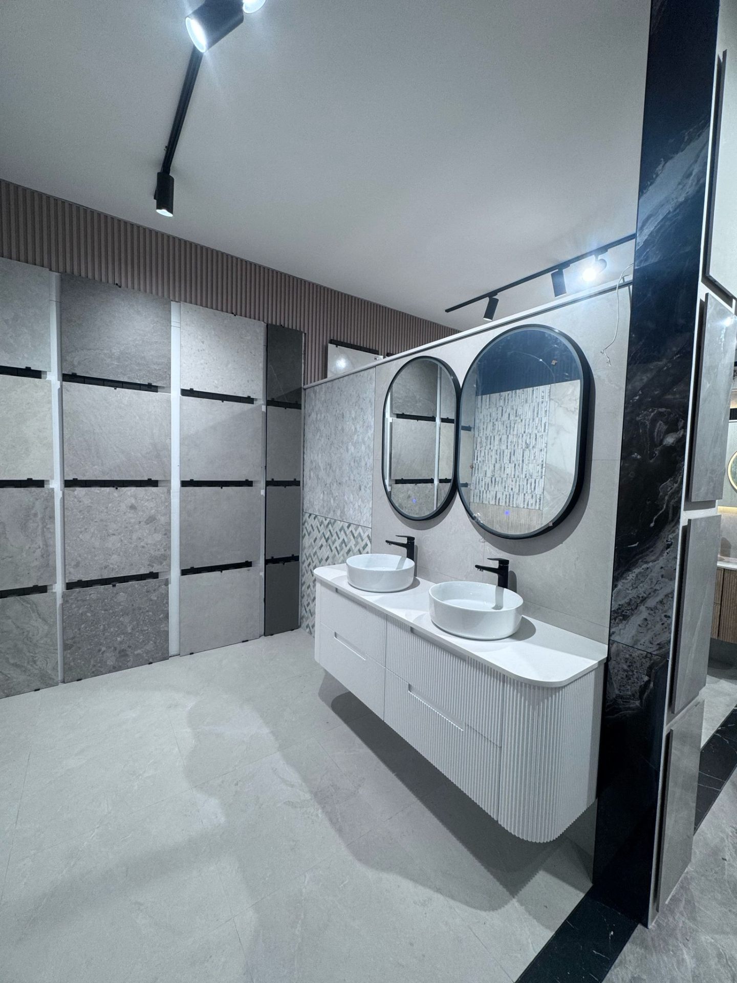 Designer stone-look tile showroom wall